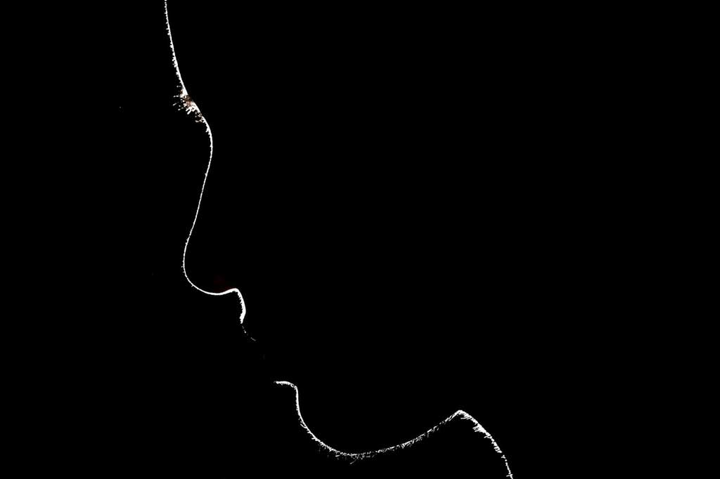 A silhouette of a woman